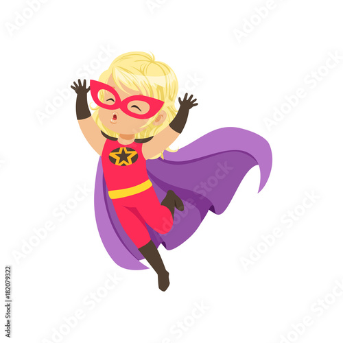 Comic brave girl kid in superhero red costume with a mask on her face and developing in the wind purple cloak, jumping with hands up.