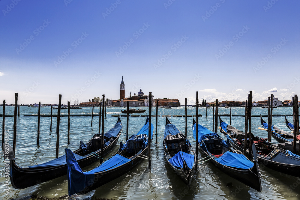 A view of the Cathedral of San Giorgio Maggiore, Venice lagoon and gondolas from the Piazza San Marco, Venice, Italy