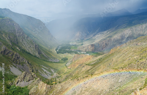 Valley of Chulyshman river with rainbow. Altai Republic. Russia