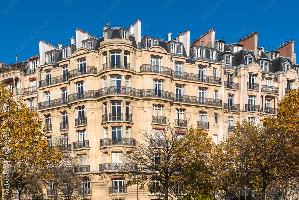 Paris, beautiful Haussmann facade in a chic area of the capital, near the Champ de Mars
