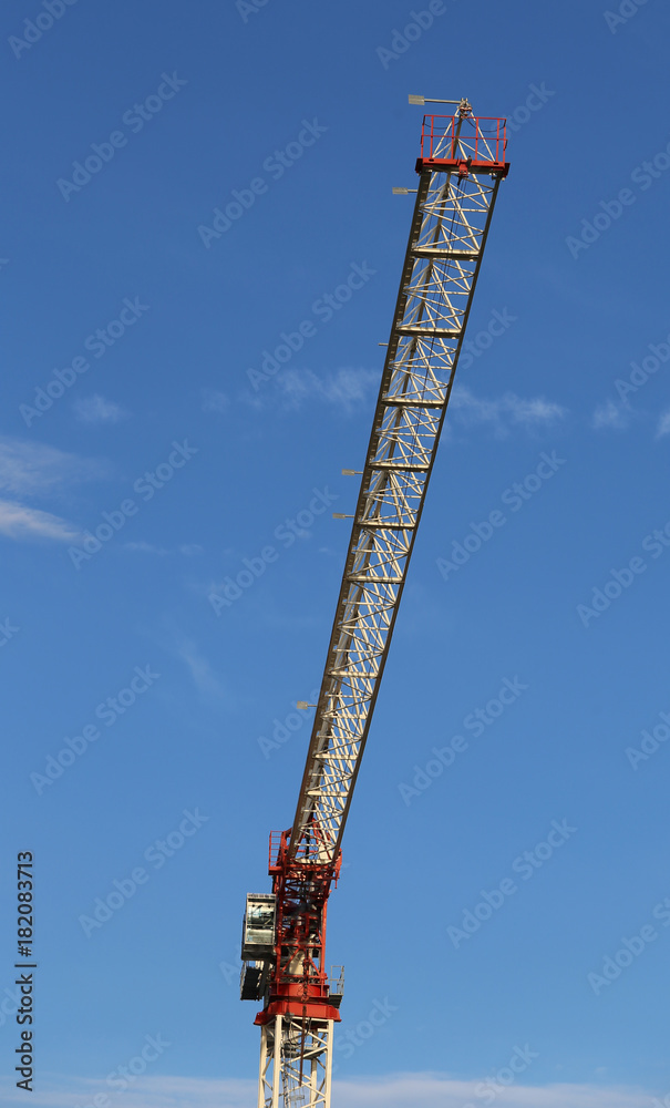 construction site crane and blue sky in the background