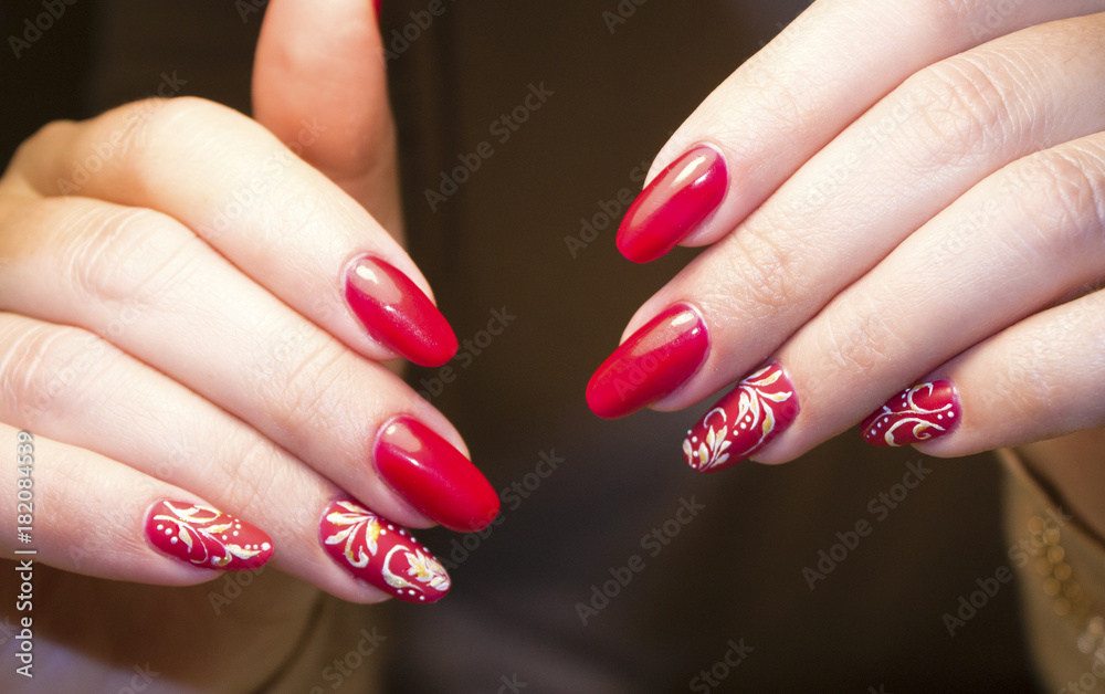 pedicure red in composition with autumn leaves pedicure red in composition with autumn leaves