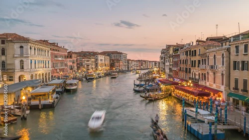 Venice city skyline day to night sunset timelapse from Rialto Bridge and Venice Grand Canal, Venice, Italy 4K Time lapse