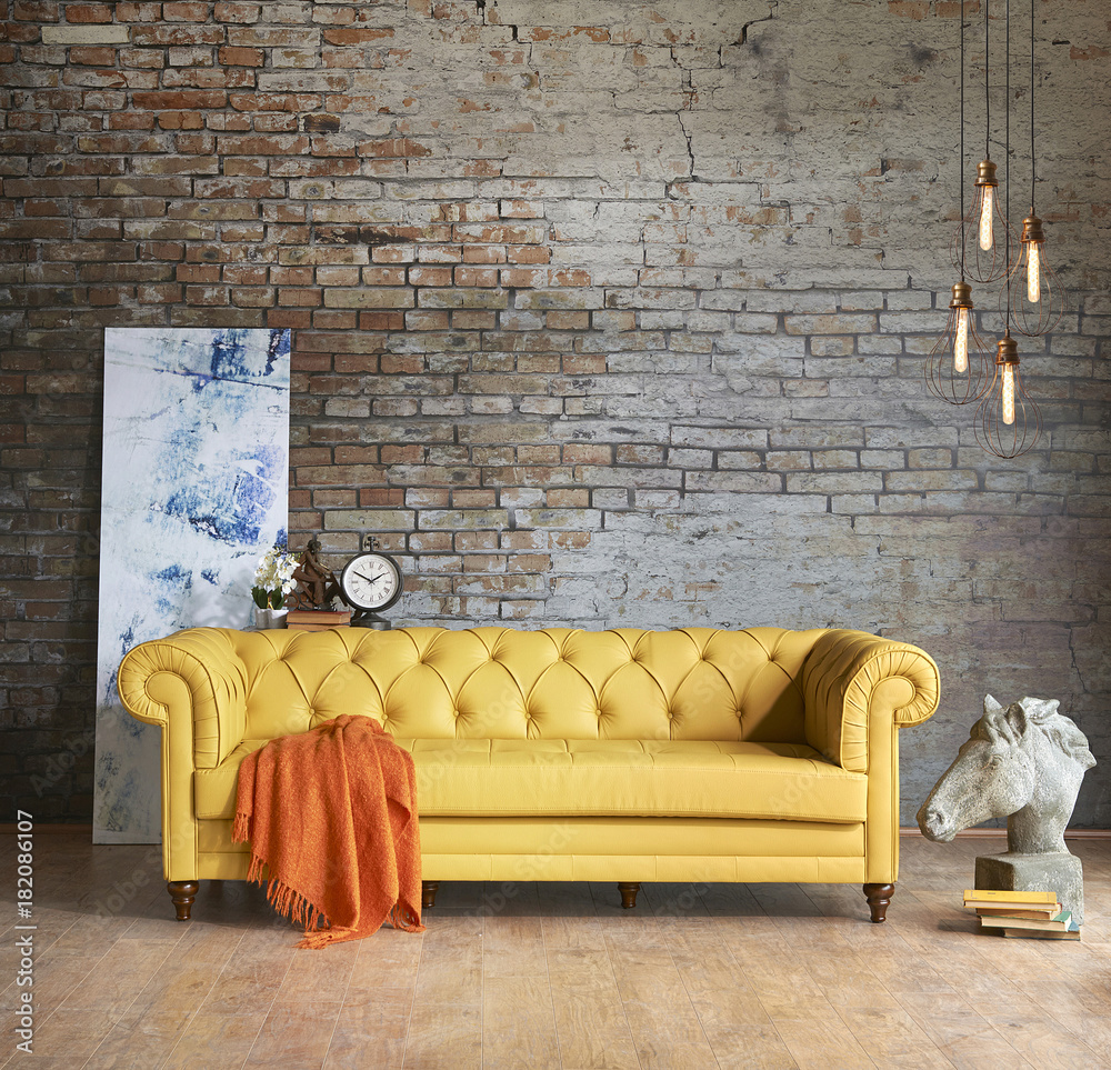 modern wall Chester sofa interior brick wall concept Stock Photo