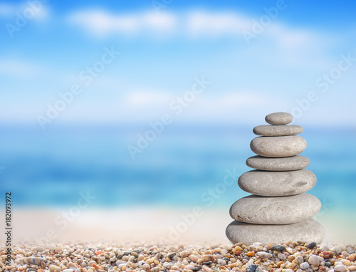 Small beach stone from large to small on beach like symbol of balance
