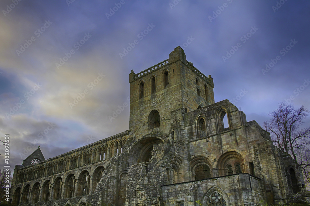 A HDR photo from below of the Jedburgh Abbey in the borderlands of Scotland