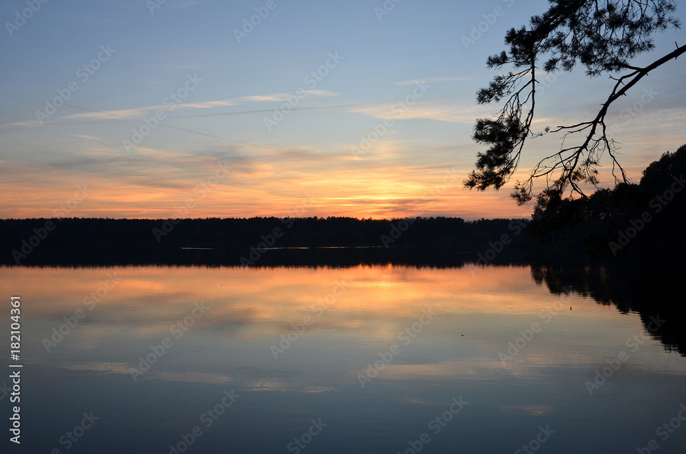 Beautiful orange sunset over the lake