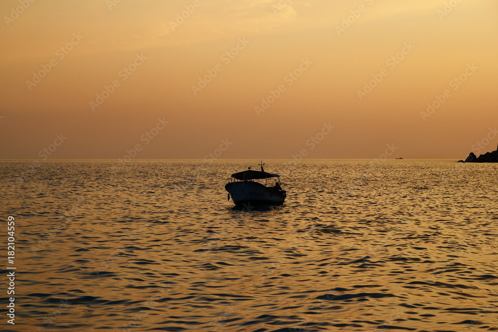 Beautiful sunset, rocky coast of Cape Fiolent. Dramatic scene. Crimea