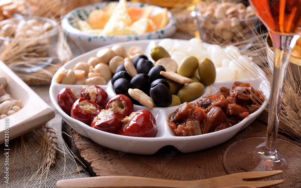 Tray and bowls with starters and snacks Tray and bowls with starters and snacks