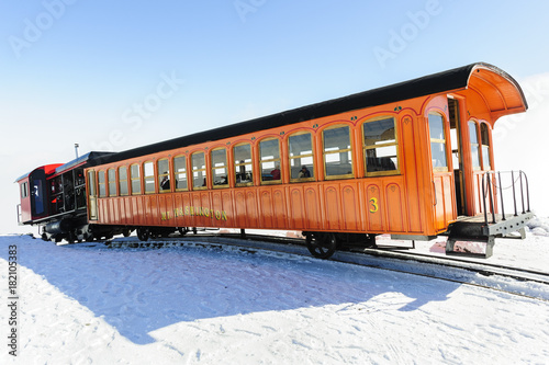 Cog Railway train leaving Mount Washington summit