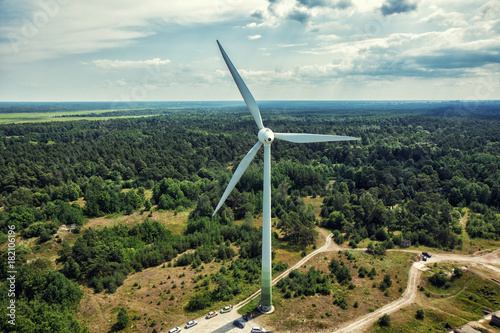 Electrical wind generator station near the blue sea in Liepaja photo