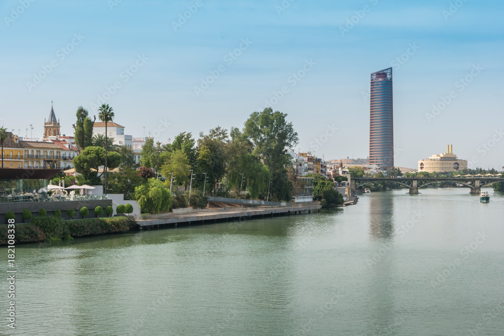 Naklejka premium Guadalquivir river Seville Tower Triana bridge Seville Spain
