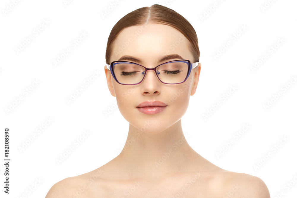 Woman in glasses. Fashion model in eyeglasses. Correction of vision. Advertising optics and eye products. Woman in glasses. Fashion model in eyeglasses. Correction of vision. Advertising optics and eye products.