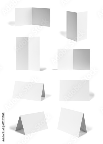 collection of various  blank folded leaflet or a desktop calendar white paper on white background. each one is shot separately © Lumos sp