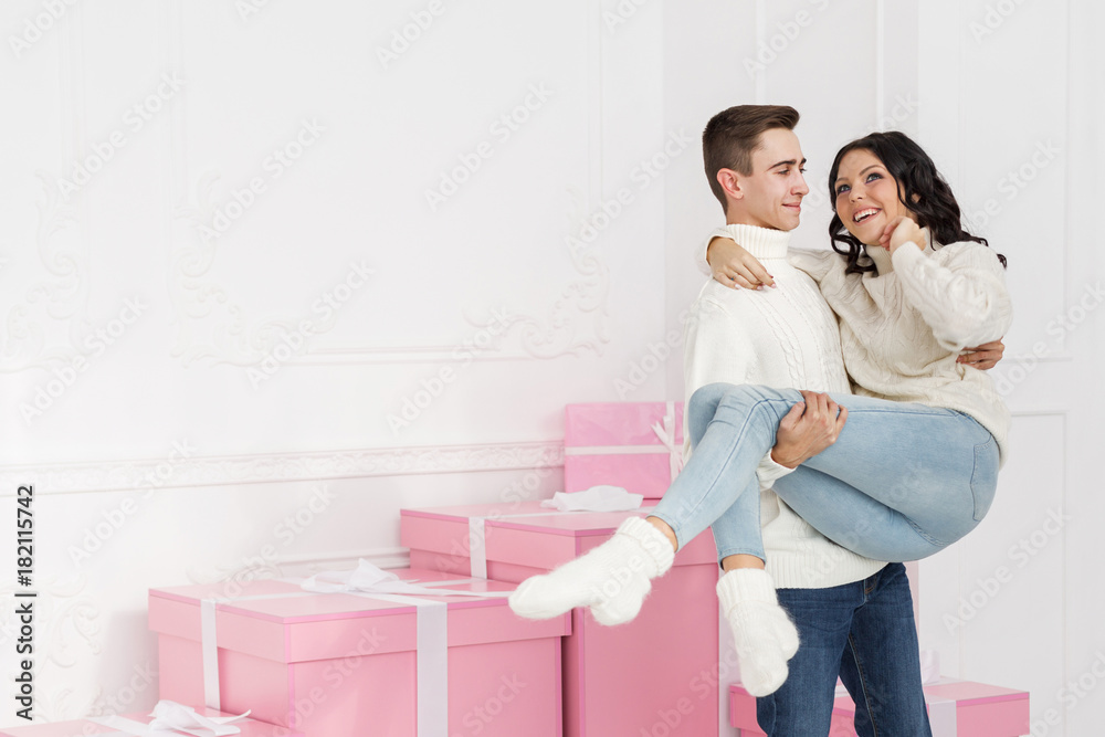 Loving couple of teens and gifts Loving couple of teens and gifts