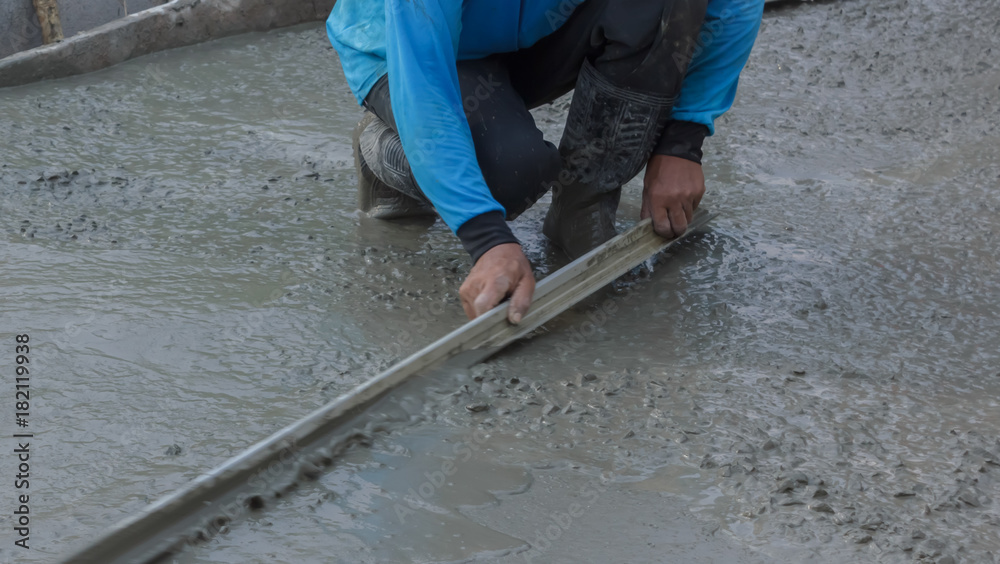 workers were building a concrete road. workers were building a concrete road.