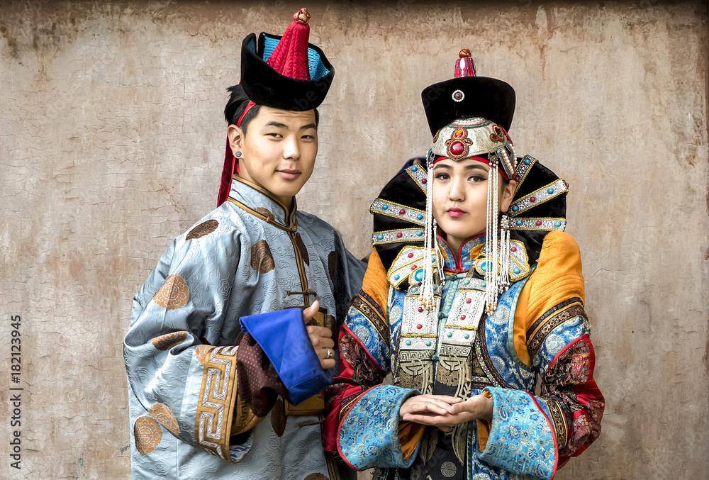 mongolian couple in traditional 13th century style outfits
