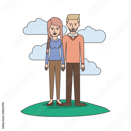 couple colorful scene outdoor and her with blouse long sleeve and pants and heel shoes with braid and fringe hairstyle and him stubble beard and sweater and pants and shoes with side parted hairstyle