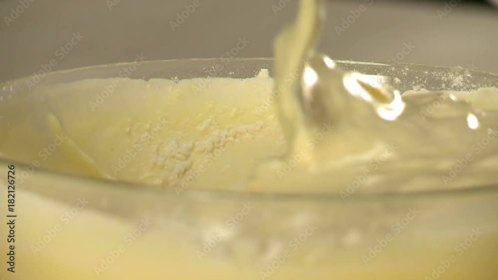 View of manual stirring dough for dessert View of manual stirring dough for dessert