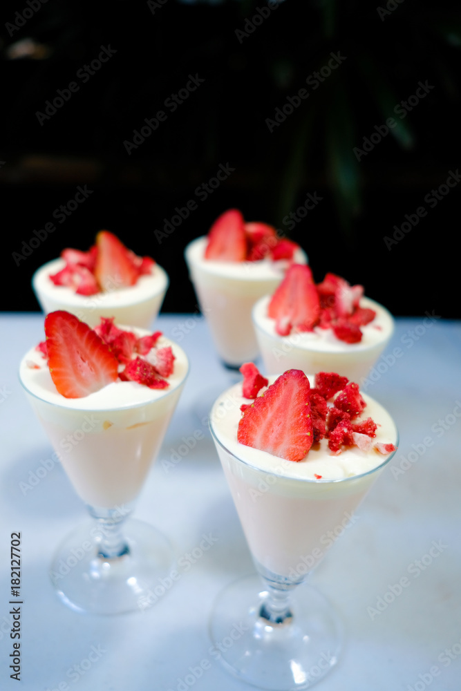 Dessert strawberries and cream. (selective focus) Dessert strawberries and cream. (selective focus)