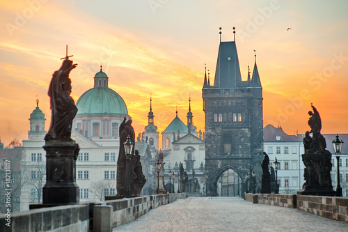 Charles Bridge (Karluv Most) and Lesser Town Tower scenic view at sunrise, Prague, Czech Republic