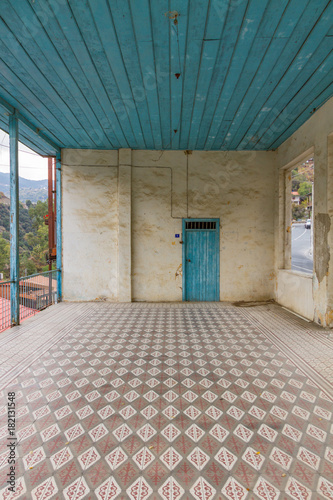 View of abandoned house interior and tiles in Cyprus village