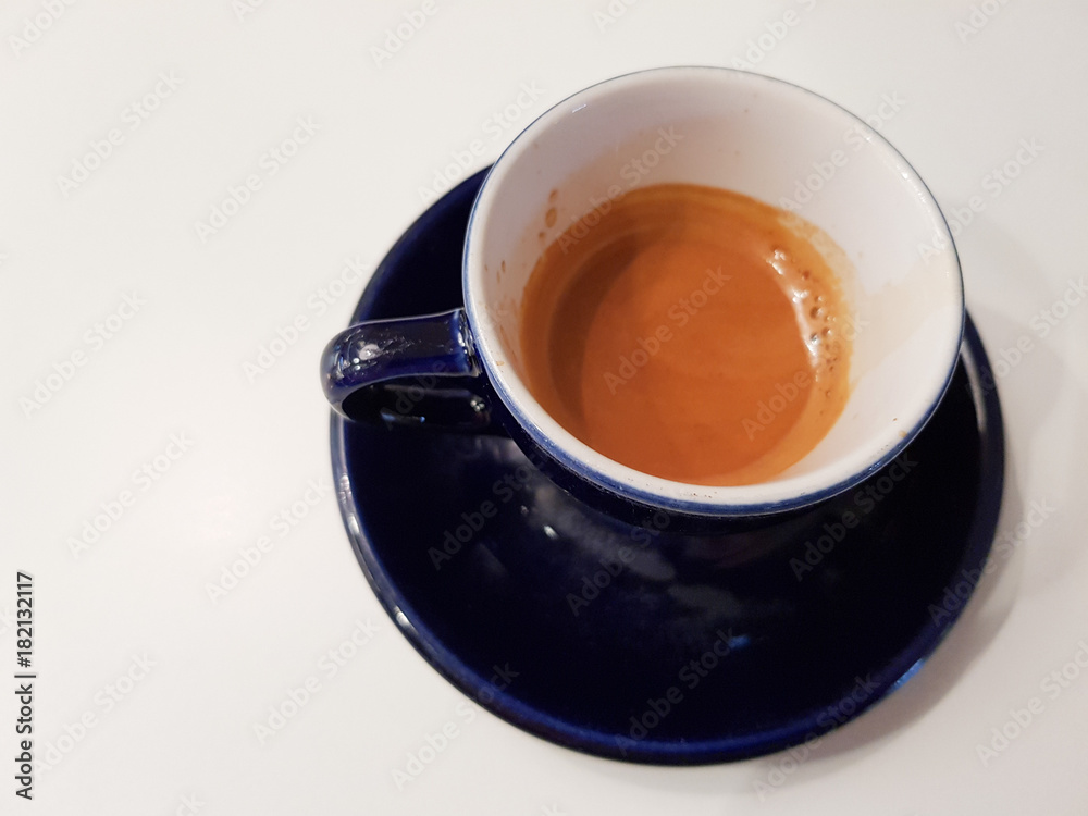 Espresso on a blue mug Espresso on a blue mug