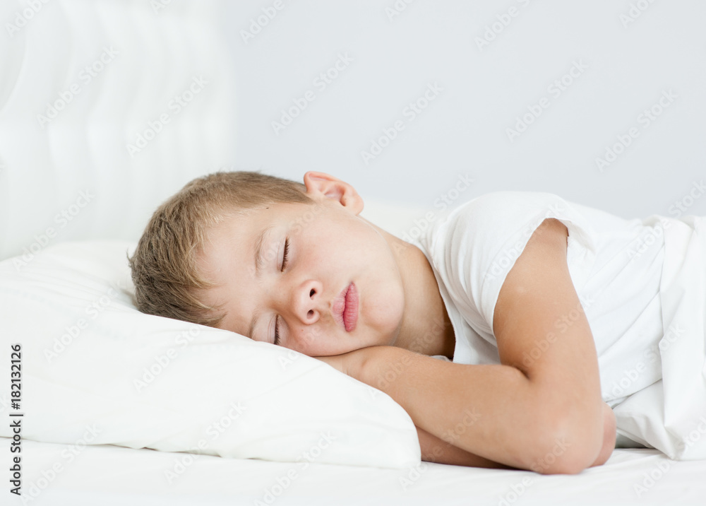 little boy sleeping on the bed little boy sleeping on the bed
