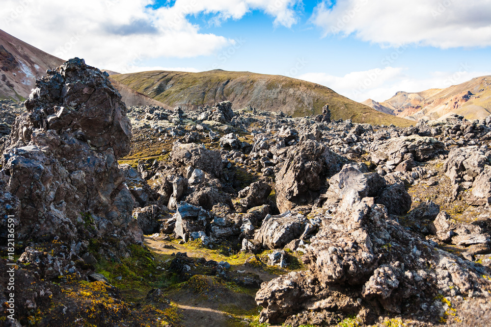 rocks near mountain slope at Laugahraun lava field