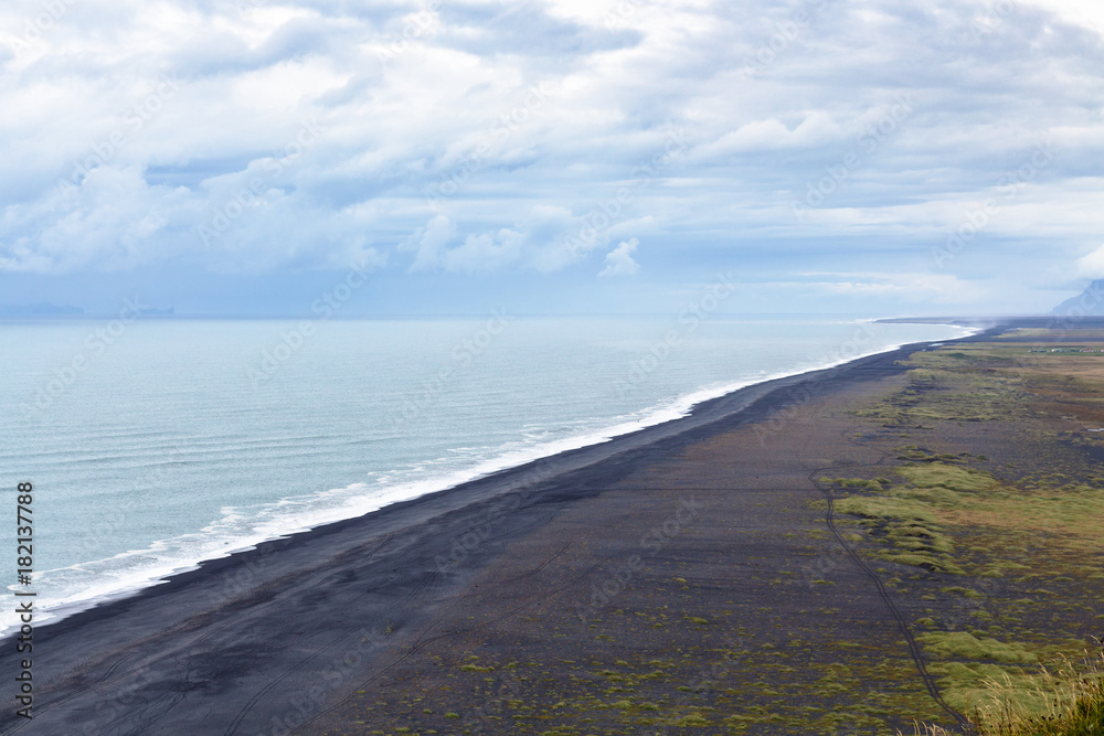 above view of Solheimafjara black beach in Iceland above view of Solheimafjara black beach in Iceland