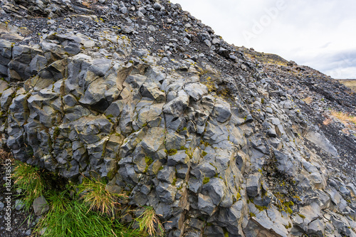 volcanic wall of Solheimajokull glacier in Iceland photo