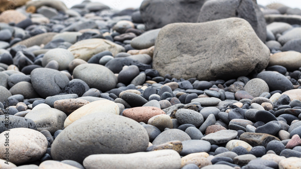 boulders on surface on Reynisfjara beach in Vik boulders on surface on Reynisfjara beach in Vik