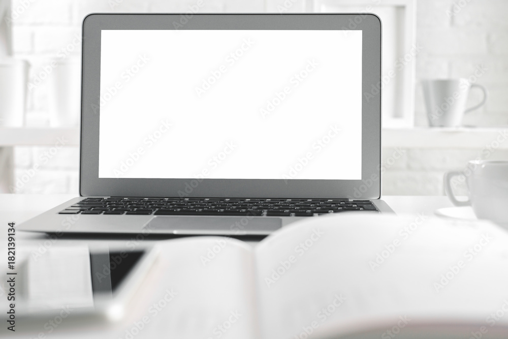 Office desk top with empty laptop screen Office desk top with empty laptop screen