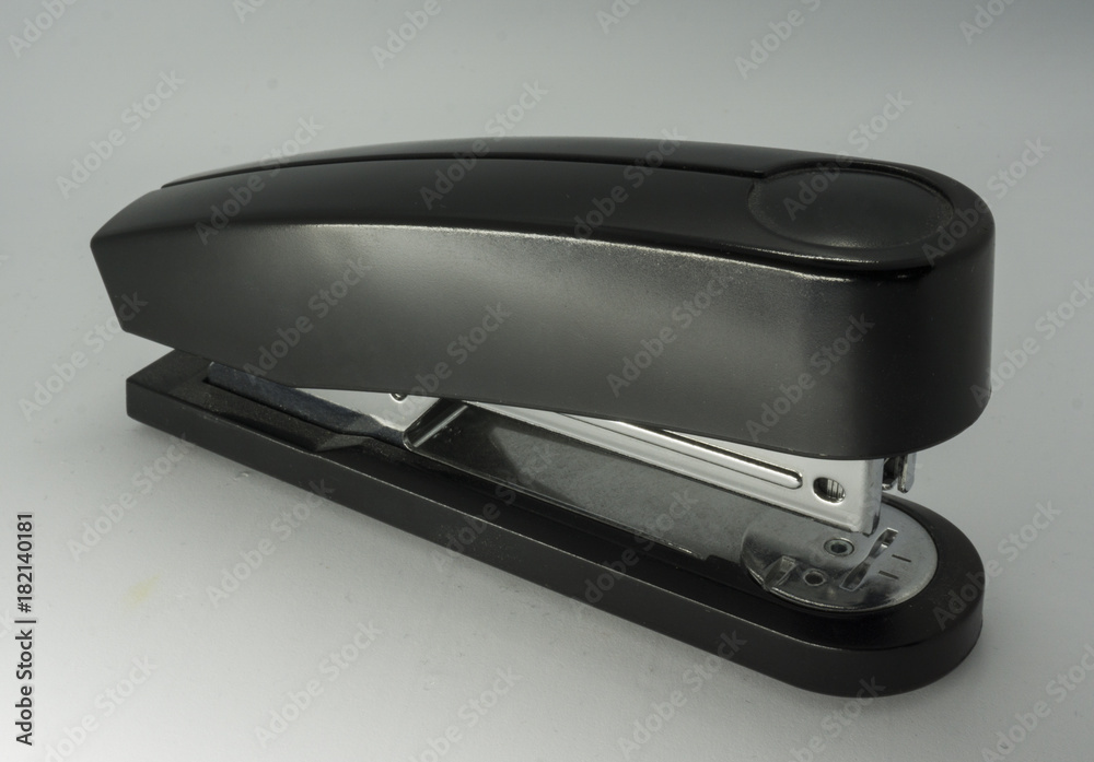 Black classic stapler on white background Black classic stapler on white background