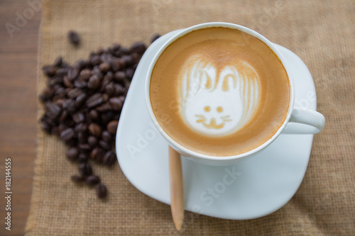 Easter rabbit drawing on latte art coffee cup