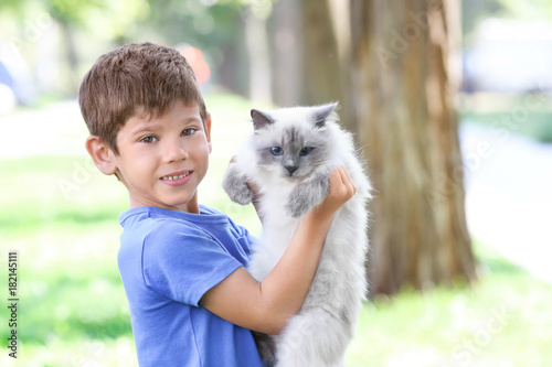 Cute little boy with fluffy...