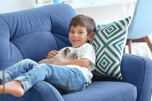 Cute little boy with fluffy...