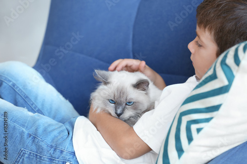 Cute little boy with fluffy...