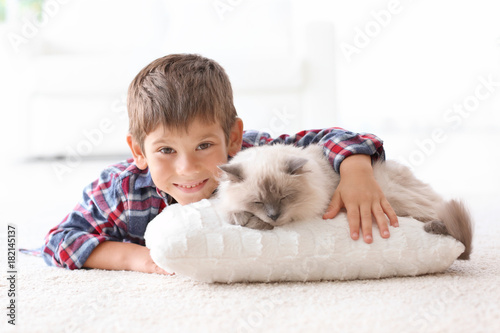 Cute little boy with fluffy...