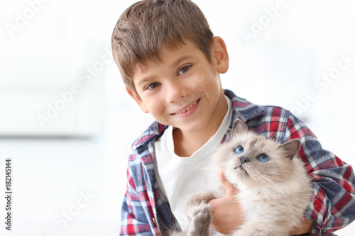 Cute little boy with fluffy...