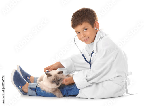 Cute little boy in doctor u...