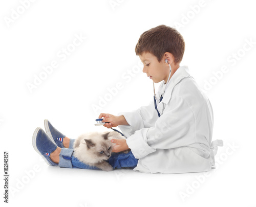 Cute little boy in doctor u...