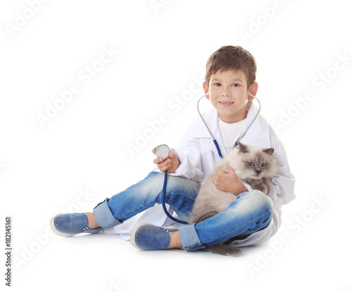 Cute little boy in doctor u...