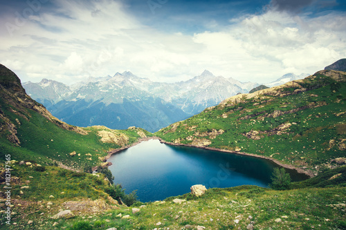 Landscape of beautiful Lake with Rocky Mountains Summer Travel serene aerial view