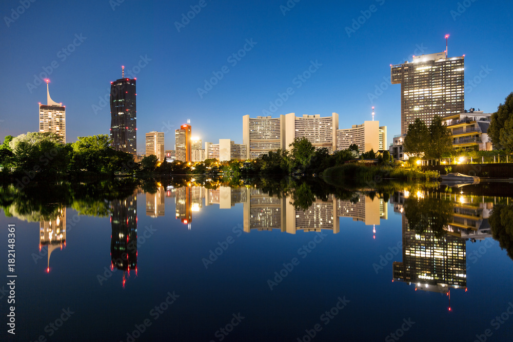 Vienna skyline on the Danube river at night