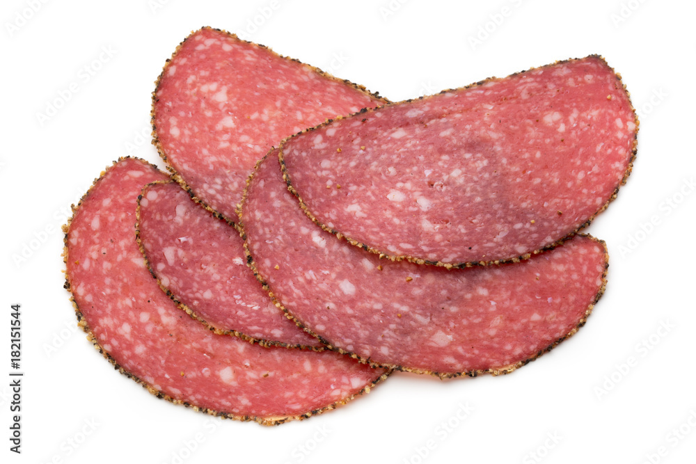 Salami slices isolated on the white background.