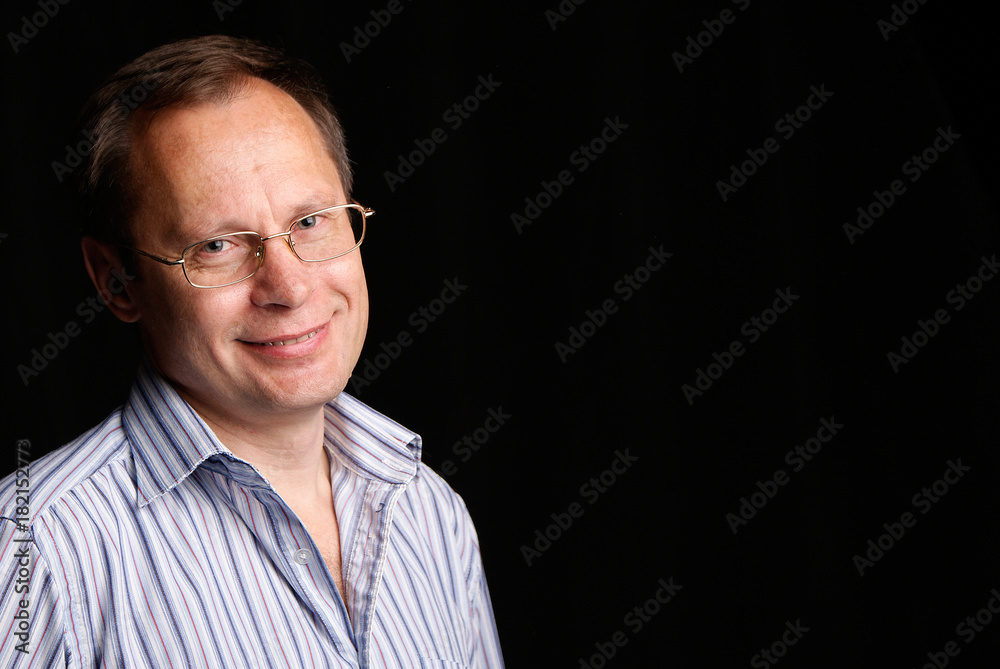 Fototapeta premium White Man in glasses posing in studio
