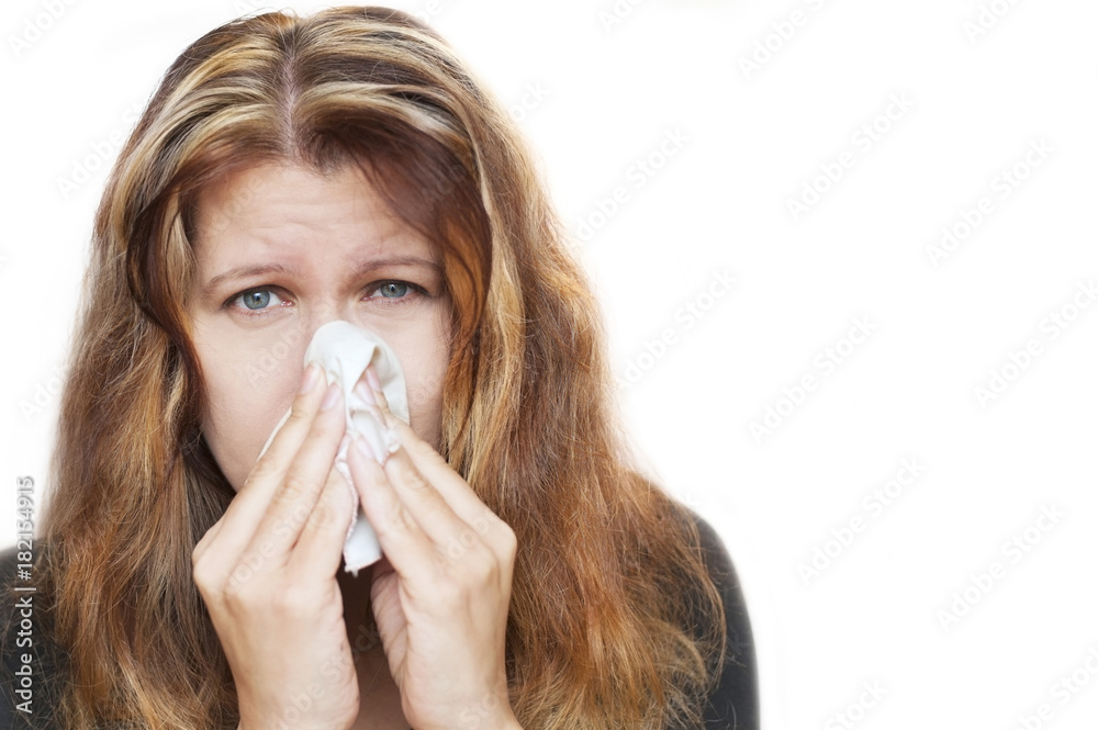 Affected by cold woman wipes her nose with handkerchief on white background Affected by cold woman wipes her nose with handkerchief on white background
