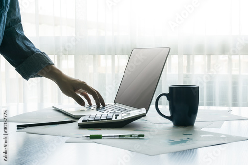 businessman typing on notebook keyboard. finances and business concept