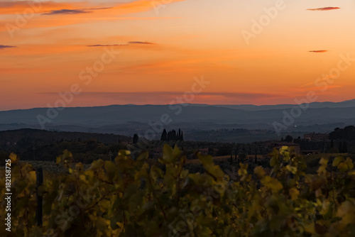 sunset over the chianti hills in autumn in province of Siena Tuscany Italy...